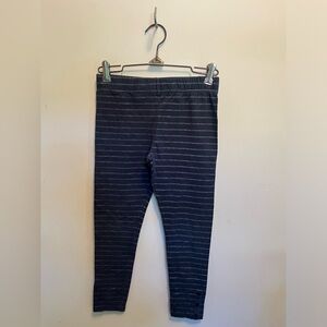 Lands End, girls youth blue leggings with silvers stripes and buttons on bottom.